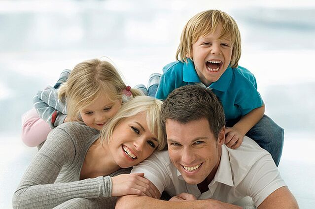 happy family and a man who has stopped drinking